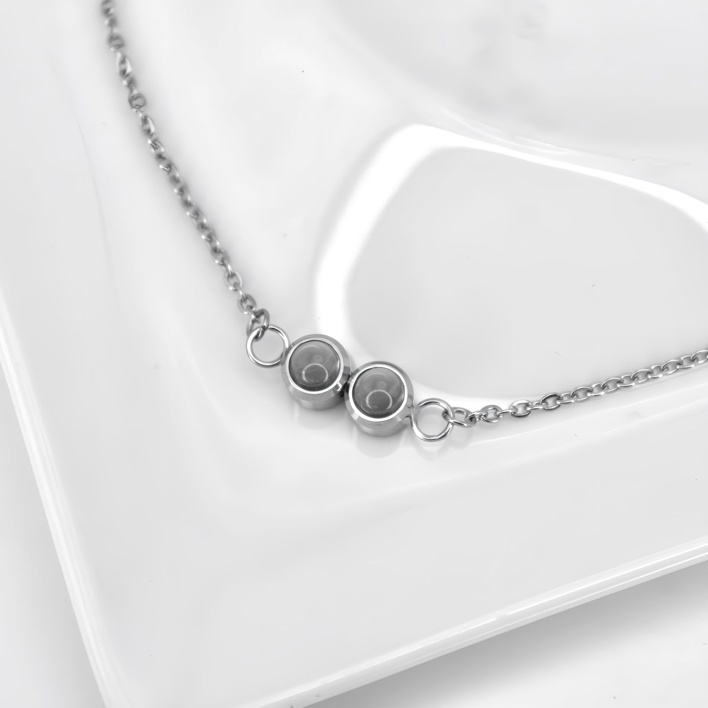 pulsera minimalista de cadena con doble proyección