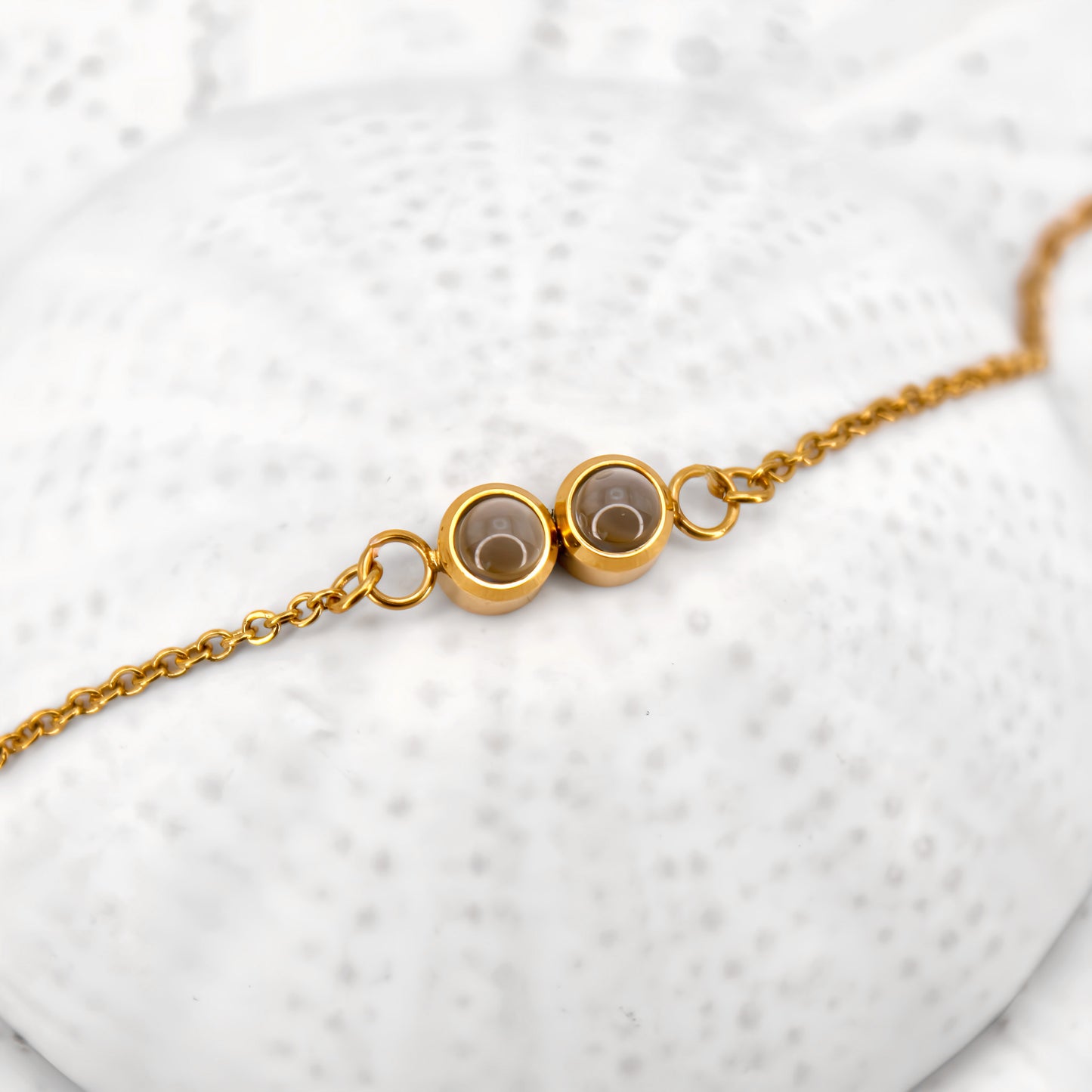 pulsera minimalista de cadena con doble proyección