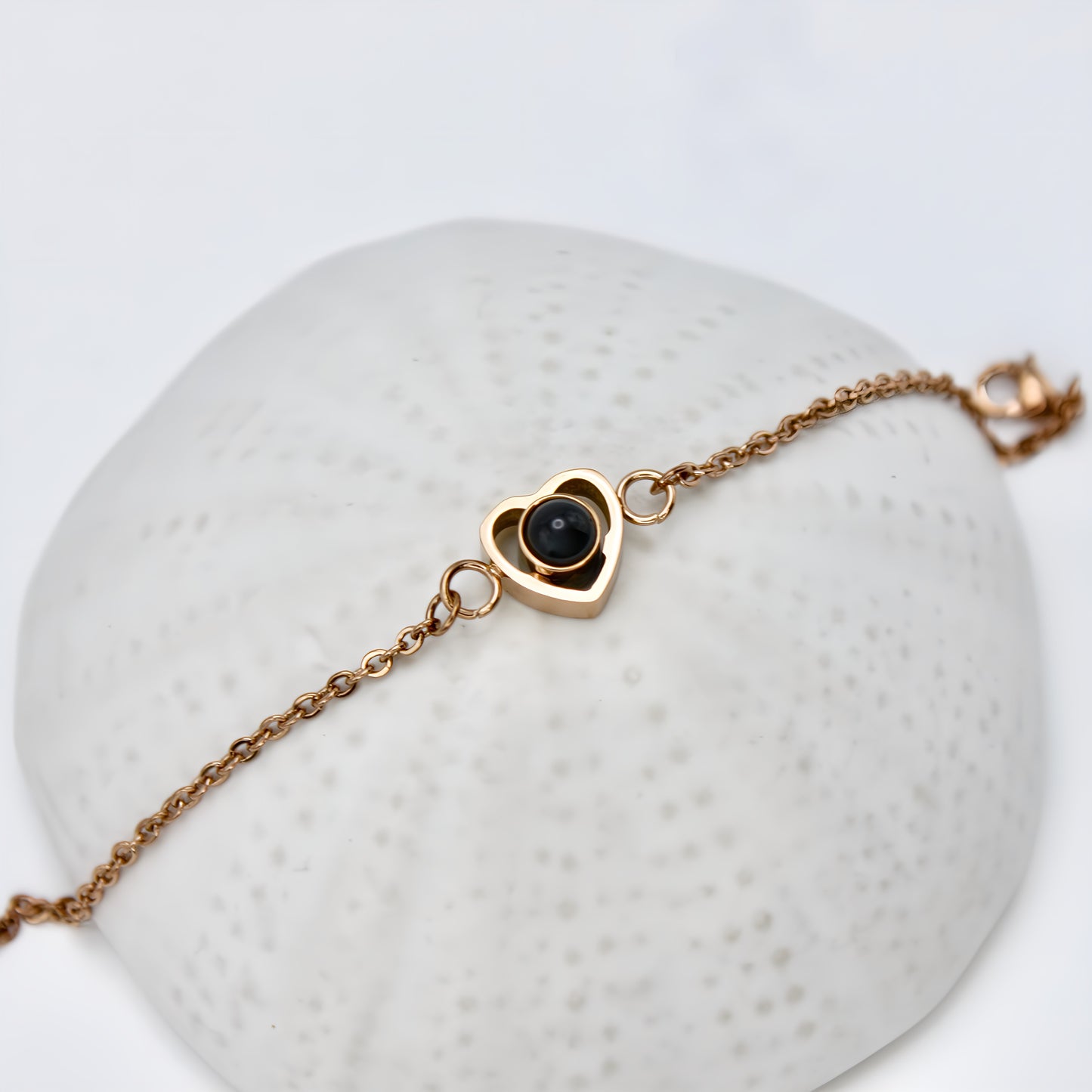 pulsera de cadena con proyección de corazón