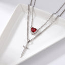 Heart & Sword Couple's Necklace in silver on a jewellery tray