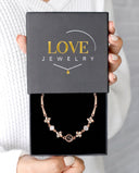 Lucky Clover Projection Bracelet in rose gold, presented in a Love Jewelry gift box