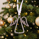Angel Projection Christmas Ornament hanging on a Christmas tree