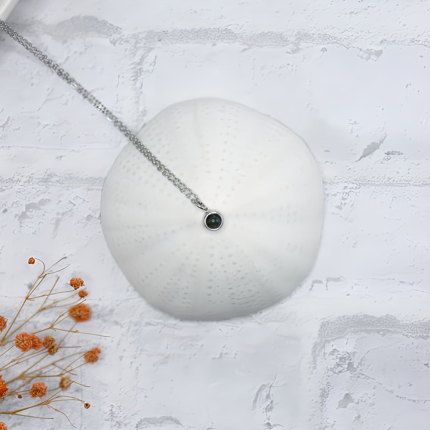 minimalist projection necklace with photo inside