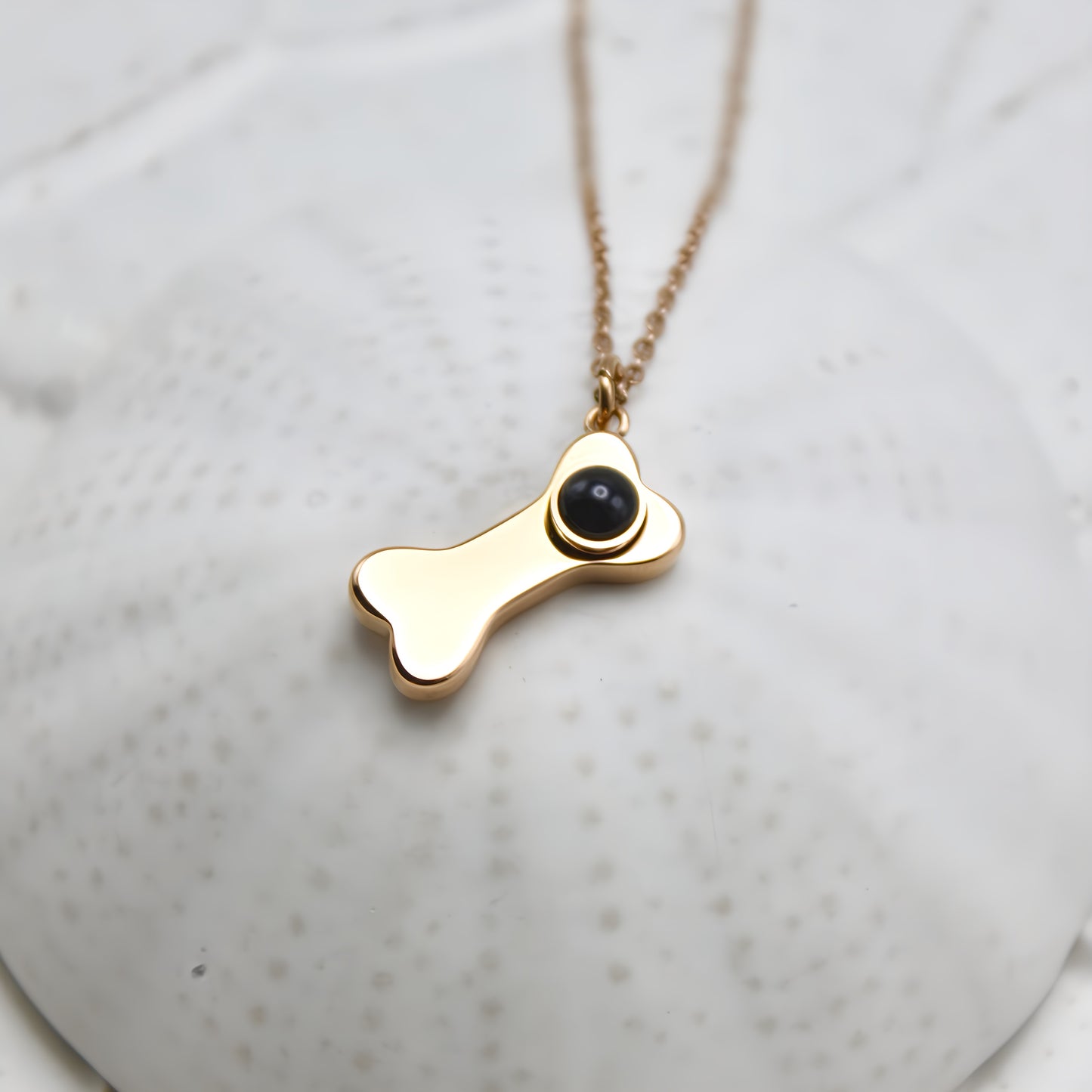 dog bone projection necklace