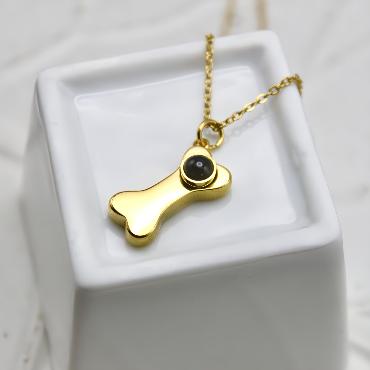 dog bone projection necklace