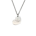 Silver heart-shaped pendant necklace with 'Always Grateful' engraving on a light gray background