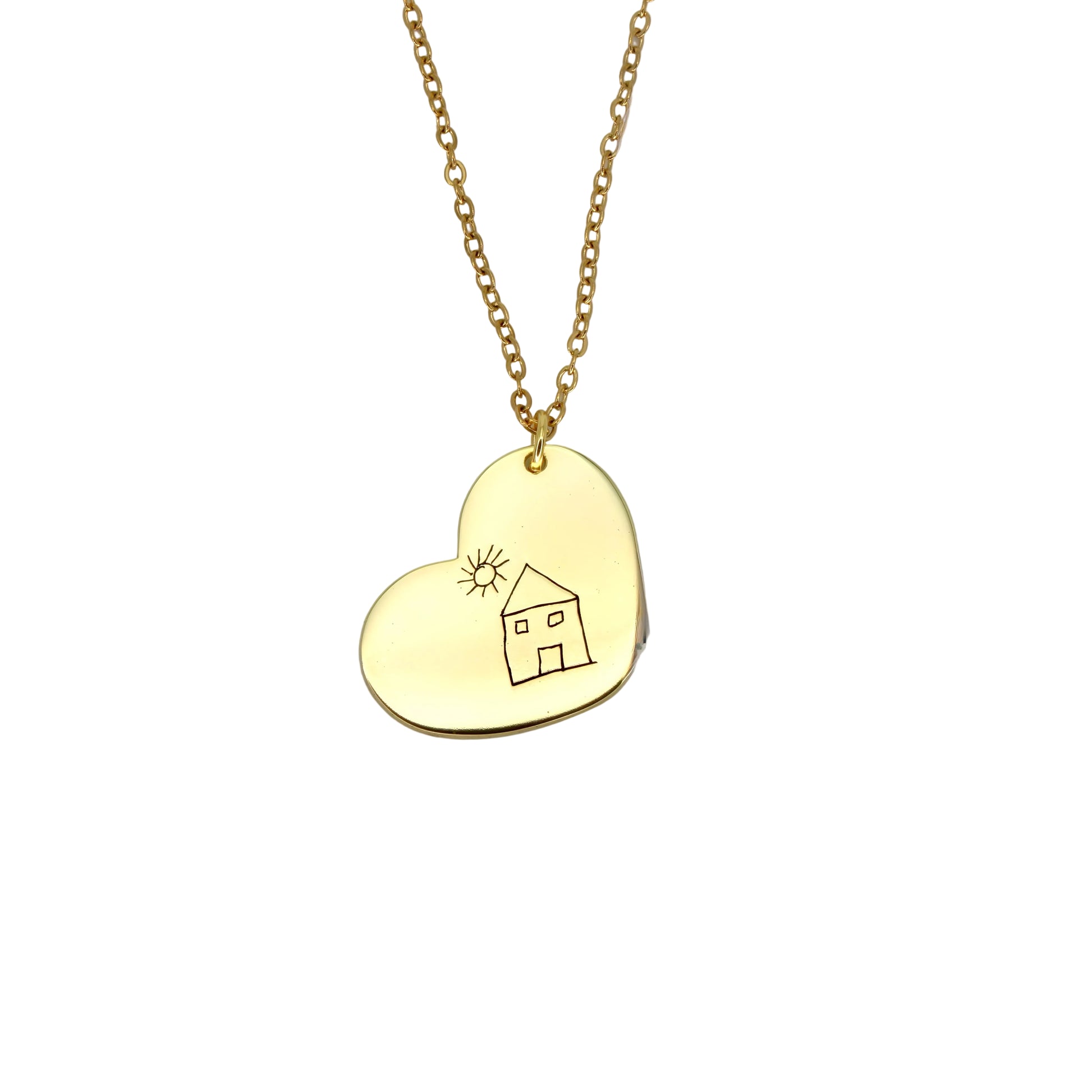 Gold heart-shaped necklace with a house and sun design on a light gray background