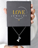 Dog Bone Projection Necklace in silver, presented in a Love Jewelry gift box