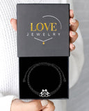 My Best Friend Paw Projection Bracelet in silver, presented in a Love Jewelry gift box