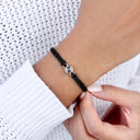 Bestseller Rope Circle Projection Bracelet in silver, worn on the wrist