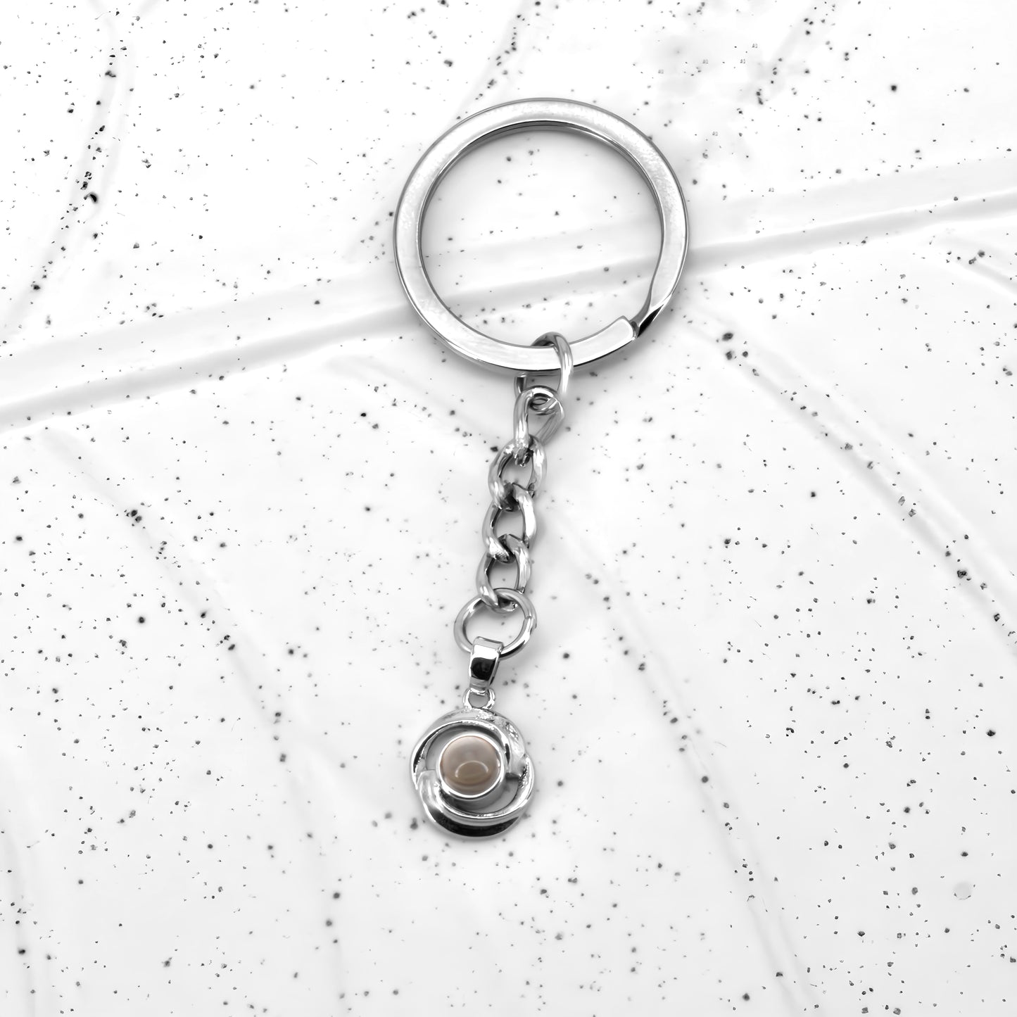 swirl projection keychain