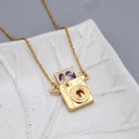 Camera Custom Photo Locket in gold, on a leaf dish