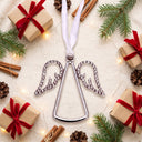 Angel Projection Christmas Ornament in a festive Christmas flat lay