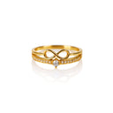 Sparkling Infinity Ring in gold on a white background