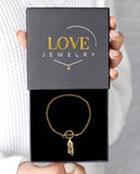 Pet Engraved Chain Bracelet in gold, presented in a Love Jewelry gift box