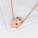 Camera Custom Photo Locket in rose gold, on a jewellery tray