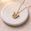 Butterfly Custom Photo Locket in gold, on a round dish
