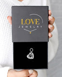 Love You Forever Projection Charm in silver, presented in a Love Jewelry gift box