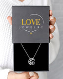 Midnight Moon Projection Necklace in silver, presented in a Love Jewelry gift box