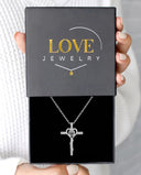Minimalist Diamond Cross Projection Necklace in silver, presented in a Love Jewelry gift box