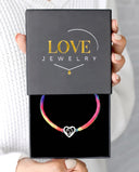 Rainbow Heart Projection Bracelet in silver, presented in a Love Jewelry gift box