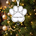Paw Projection Christmas Ornament hanging on a Christmas tree