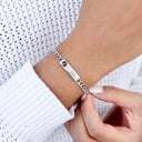 Cuban Engraved Projection Bracelet in silver, worn on the wrist
