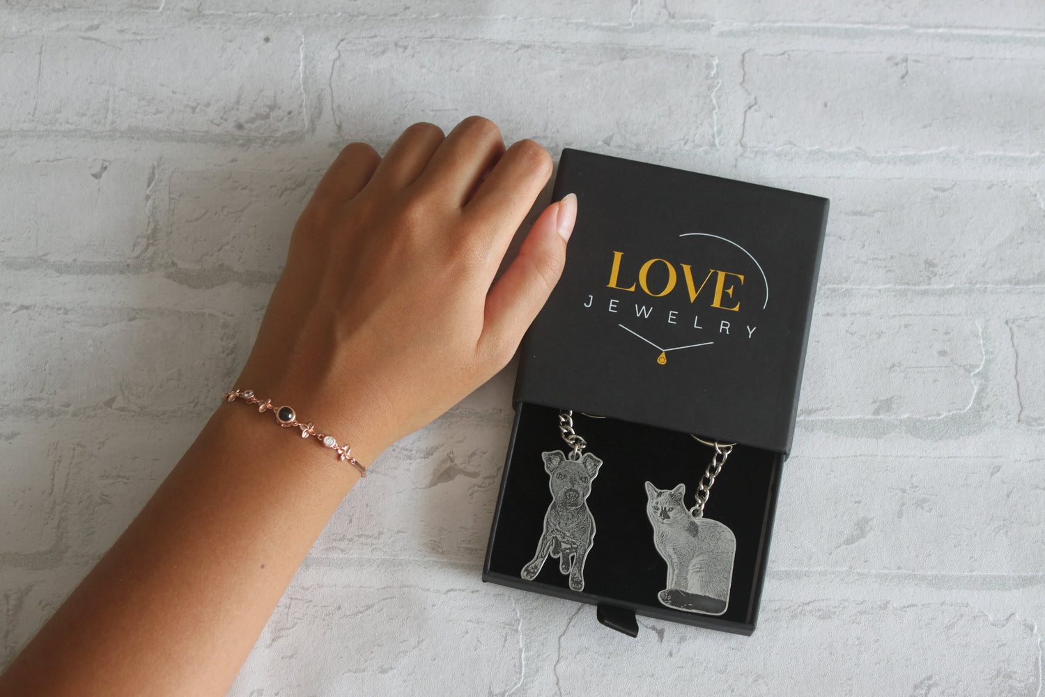 Photo of memorial jewelry with projection bracelet
