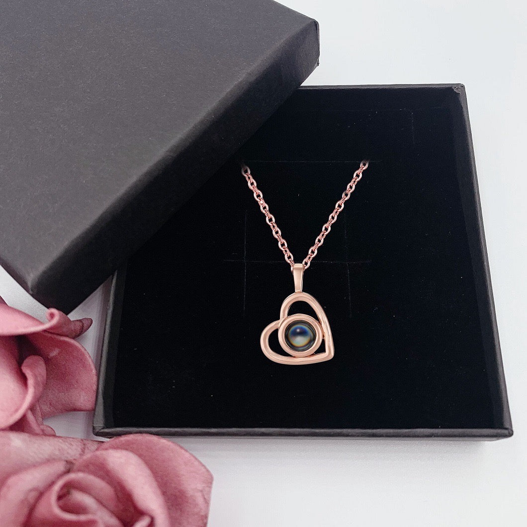 "cherish moments with small heart projection necklace"