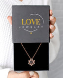 Lucky Star Projection Necklace in rose gold, presented in a Love Jewelry gift box