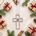 Forever Cross Projection Christmas Ornament styled in a Christmas flat lay