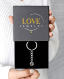 Minimalist Projection Keychain in silver, presented in a Love Jewelry gift box