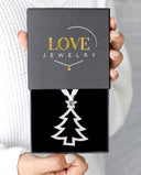 Christmas Tree Projection Ornament in silver, presented in a Love Jewelry gift box