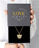 Butterfly Custom Photo Locket in gold, presented in a Love Jewelry gift box