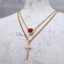 Heart & Sword Couple's Necklace in gold on a jewellery bust