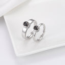 Minimalist Couple Projection Ring in silver on a jewellery tray