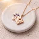 Camera Custom Photo Locket in rose gold, on a round dish