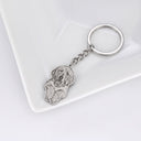 Silhouette Pet Photo Engraved Keychain in silver on a jewellery tray