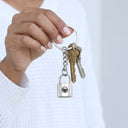 Padlock Projection Keychain with keys, held in hand