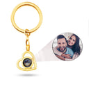Heart Projection Keychain in gold, shown on a white background